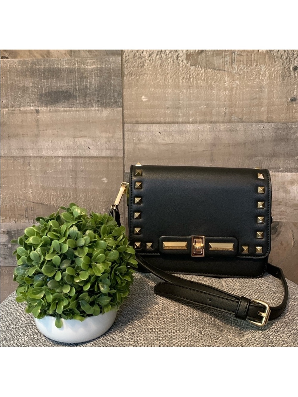 Black Crossbody with spikes and turn lock closure